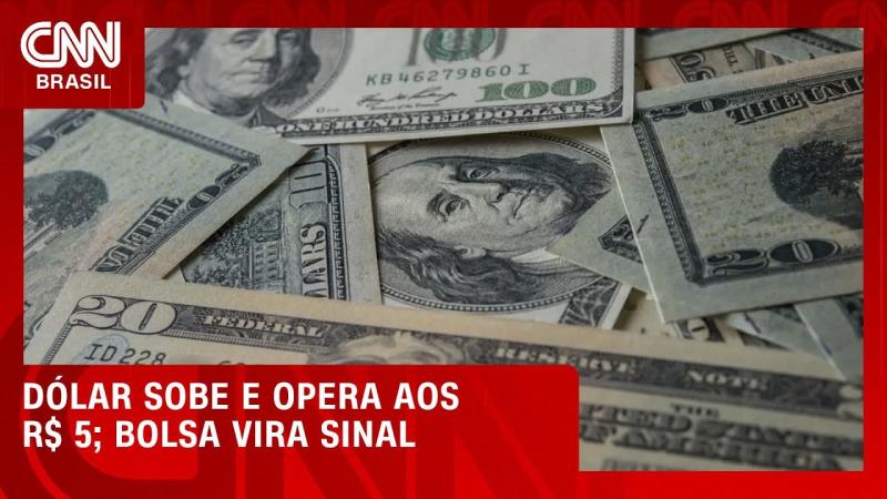 Dólar sobe e volta a R$ 5; Bolsa recua com pressão do exterior 